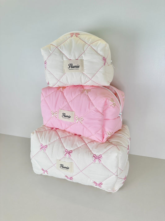 Flumie Ribbon Puff pouch set – small, medium, large stacked in pastel tones