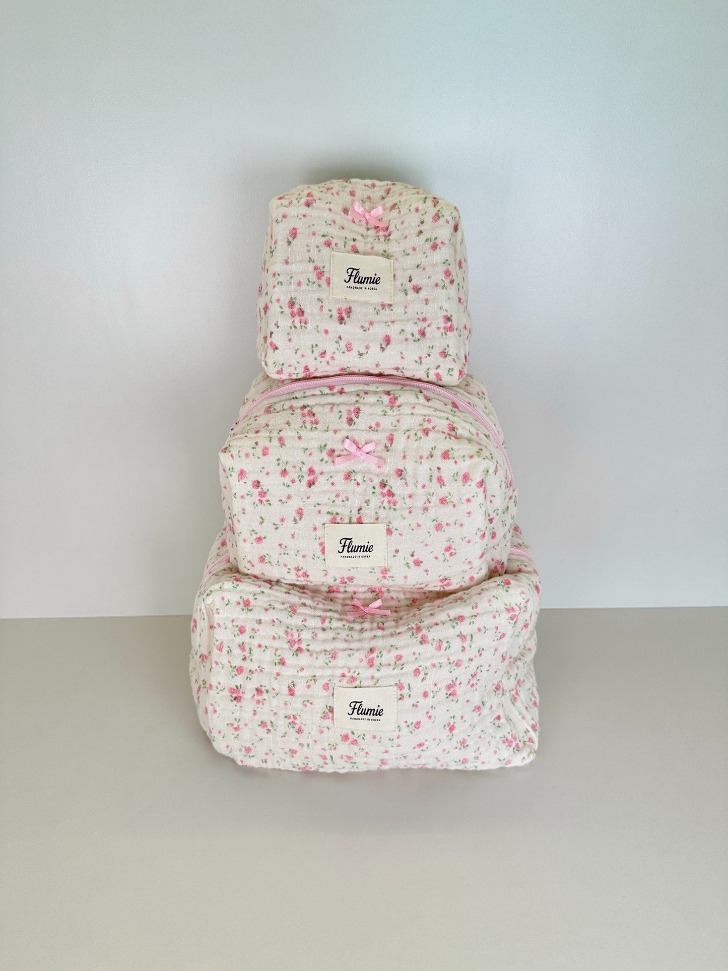 Rosymilk handmade floral pouches in S M L – girly quilted texture by Flumie